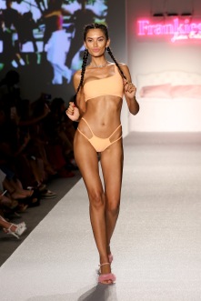 MIAMI BEACH, FL - JULY 22: A model walks the runway during the SWIMMIAMI Frankie's Bikinis 2018 Collection fashion show at the SWIMMIAMI tent on July 22, 2017 in Miami Beach, Florida. (Photo by Alexander Tamargo/Getty Images for SWIMMIAMI)